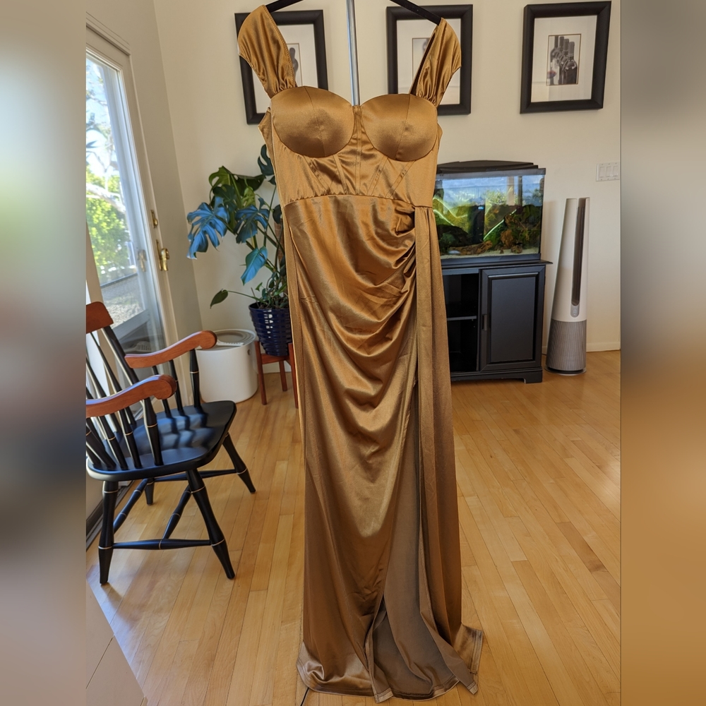 Gold corseted evening gown with leg slit